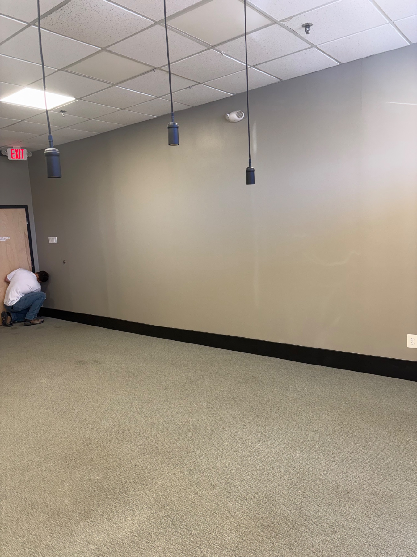 Uneven floors -> new baseboard scribed and installed.